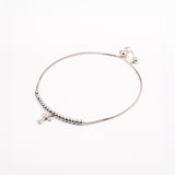PULSERA CRUZ ESFERAS RODIO